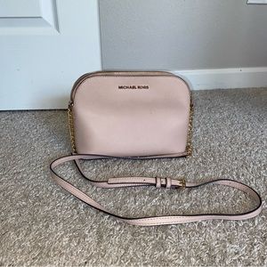 Rose gold Michael Kors purse